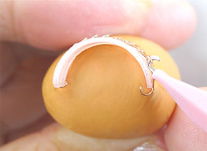 Hang the hook on the opposite side.